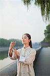 Young Woman Practicing Tai Ji