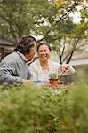 Smiling senior couple in garden