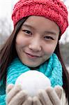 Young Woman with Snowball