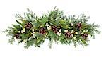 Christmas floral decoration with mistletoe, ivy. pinecones and winter greenery over white background.
