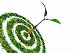 a partial view of a green dartboard covered by grass and flowers shows a perfect shot of a dart formed by a small plant with two leaves on a white background
