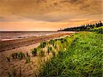 Cape Jourimain Beach and Lighthouse located in New Brunswick Canada hdr with dramatic sky