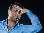 caucasian man unshaven stink smell portrait isolated studio on black background