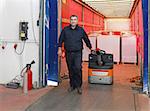 Loading goods in truck with pallet jack