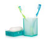 Two toothbrushes and soap. Isolated on white background