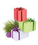 Colorful christmas gift boxes, fir tree and decor. Isolated on white background