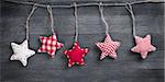 christmas vintage decorations hanging on string, background