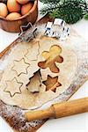 Kitchen utensil with raw Christmas cookies. Baking biscuits.