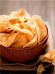 close up of a bowl of potato crisps