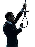 one caucasian man  holding adjusting  hangman's noose in silhouette studio isolated on white background