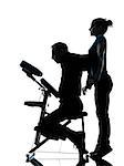 one man and woman performing chair back massage in silhouette studio on white background