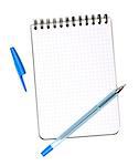 Blue pen on notepad. Isolated on white background