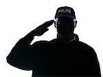 Close-up of an Afro American policeman saluting in studio on white isolated background