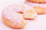 Closeup of Homemade Donuts with Pink Icing - Shallow Depth of Field