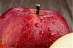 Apples closeup on wooden background.