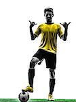 one brazilian soccer football player young man standing saluting in silhouette studio  on white background