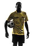 one african man referee standing holding football   in silhouette  on white background