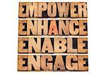 empower, enhance, enable and engage - motivational business concept - a collage of isolated words in letterpress wood type