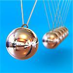 A Colourful 3d Rendered Newtons Cradle Illustration against a Blue Background