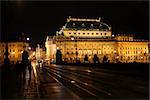 Night urban scene with big alight building. Prague,Czech Republic