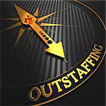 Outstaffing - Business Concept. Golden Compass Needle on a Black Field Pointing to the Word "Outstaffing". 3D Render.