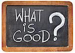 what is good question - ethical concept - white chalk handwriting on a vintage slate blackboard