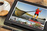 reviewing pictures of stand up paddling featuring a senior male on a digital tablet computer in black leather case with  coffee cup and cookie, the same model on all pictures