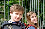 Two schoolchildren looking at camera, portrait, Munich, Bavaria, Germany