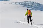 Back country skier ploughing through snow, European Alps, Tyrol, Austria