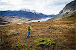 Man speed hiking in rocky landscape, Norway, Europe