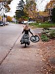 Girl Trick or Treating in Witch Costume, Toronto, Ontario, Canada