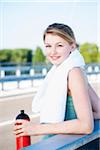 Young Woman with Towel and Water Bottle, Worms, Rhineland-Palatinate, Germany
