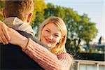 Portrait of Young Couple Outdoors, Mannehim, Baden-Wurttemberg, Germany