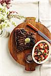 Overhead View of Steak and Salad on Cutting Board, Studio Shot