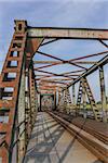 Rusty old steel railroad bridge Friesenbrucke close to Weener in Germany