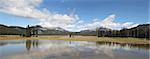 Sparks Lake in Deschutes National Forest Oregon with Three Sisters Mountains and Water Reflection Panorama