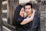 Portrait of Couple by Log Cabin, Toronto, Ontario, Canada