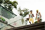 Boy and Girl with Skateboards, Mannheim, Baden-Wurttemberg, Germany