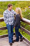 Portrait of Young Couple at Lookout, Scanlon Creek Conservation Area, Bradford, Ontario, Canada