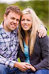 Portrait of Young Couple Outdoors, Scanlon Creek Conservation Area, Bradford, Ontario, Canada