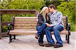 Young Couple on Park Bench, Scanlon Creek Conservation Area, Bradford, Ontario, Canada