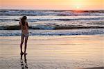 Girl standing on beach