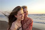 Mother and daughter looking into distance