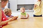 Siblings sharing pizza