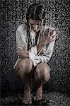 Woman in drenched shirt under shower