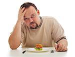 Man desperate about not having enough to eat - focus on the food and plate