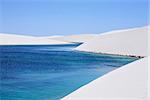 view of lagoa azul in desert sand dunes of the Lencois Maranheses National Park in brazil