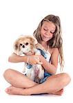 young girl and dressed chihuahua in front of white background