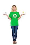 Smiling cute environmental activist holding glass jars on white background