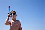 Young boy with snorkel and goggles